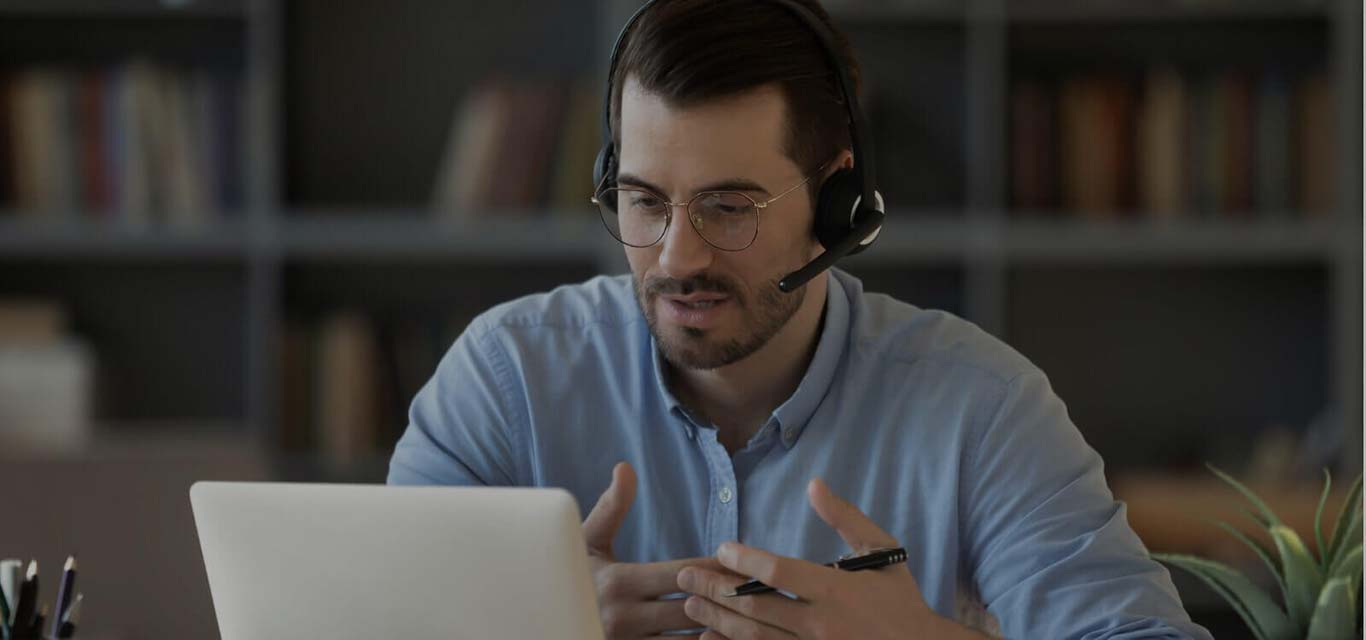 Confident Man Teacher Wearing Headset Speaking Holding Online Lesson Picture Id1223044329 3